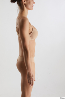 Cynthia  1 arm flexing lingerie side view underwear 0001.jpg